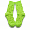 Flat lay of lime green Money Socks crew socks standing upright, displaying the embossed 3D dollar-sign pattern down each leg