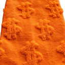 Close-up of orange Money Socks knit texture highlighting the raised 3D dollar-sign detail