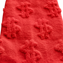 Close-up of red Money Socks knit texture highlighting the raised 3D dollar-sign detail