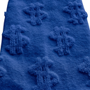 Close up of Royal Blue Money Socks showing raised 3D dollar sign texture and knit detail