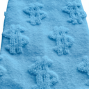 Close up of Sky Blue Money Socks showing raised 3D dollar sign texture and knit detail